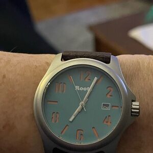 Silver and Blue Wearable Watch